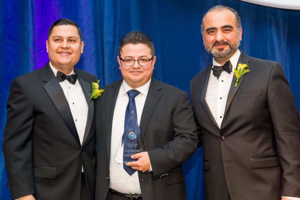 Jose posing with HACIA Leadership after winning Member of the Year